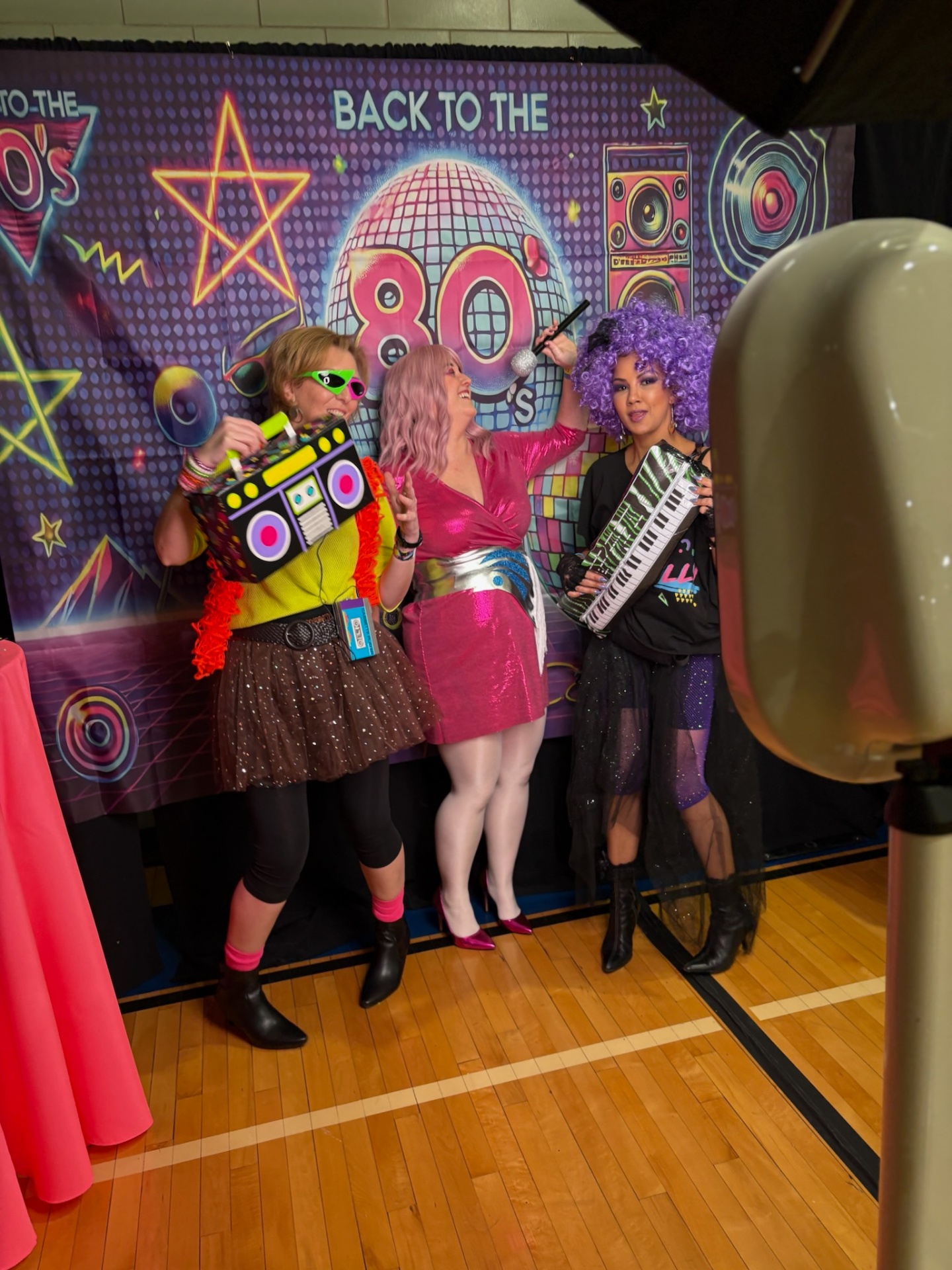 80s costume party at selfie booth